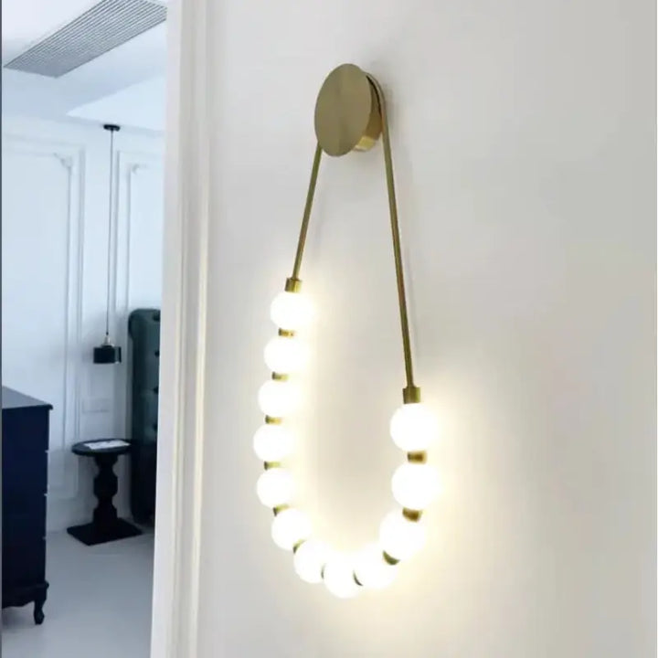 Appique murale en forme de collier de boules LED