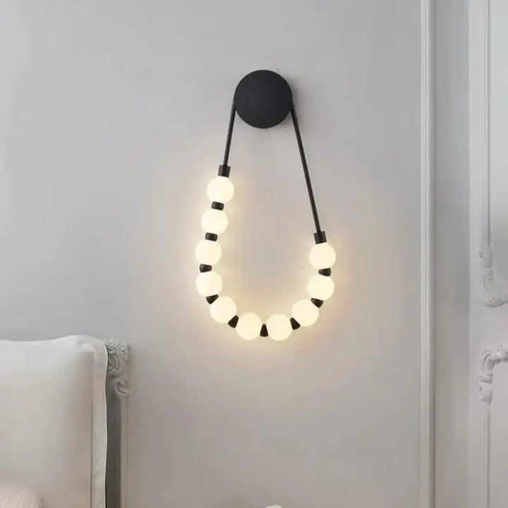 Appique murale en forme de collier de boules LED