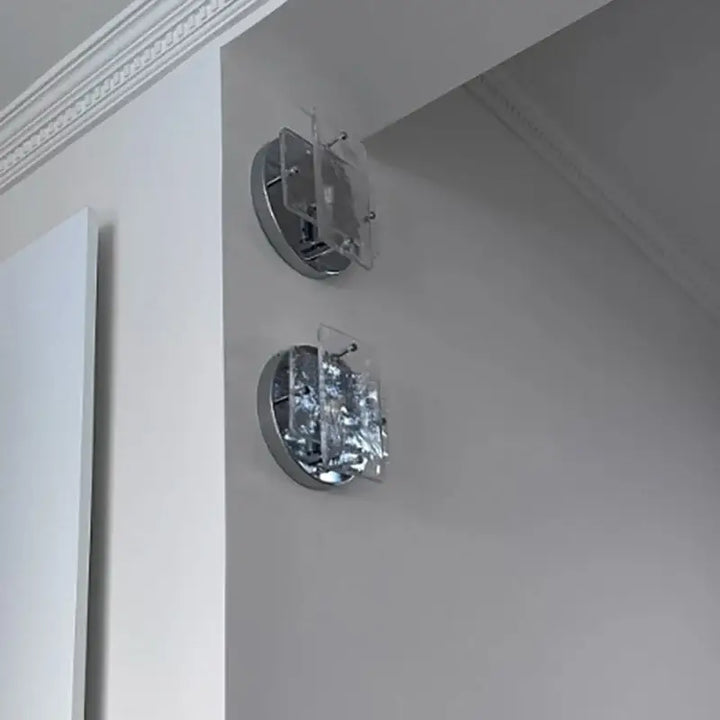 Applique murale couleur chrome avec façade en verre