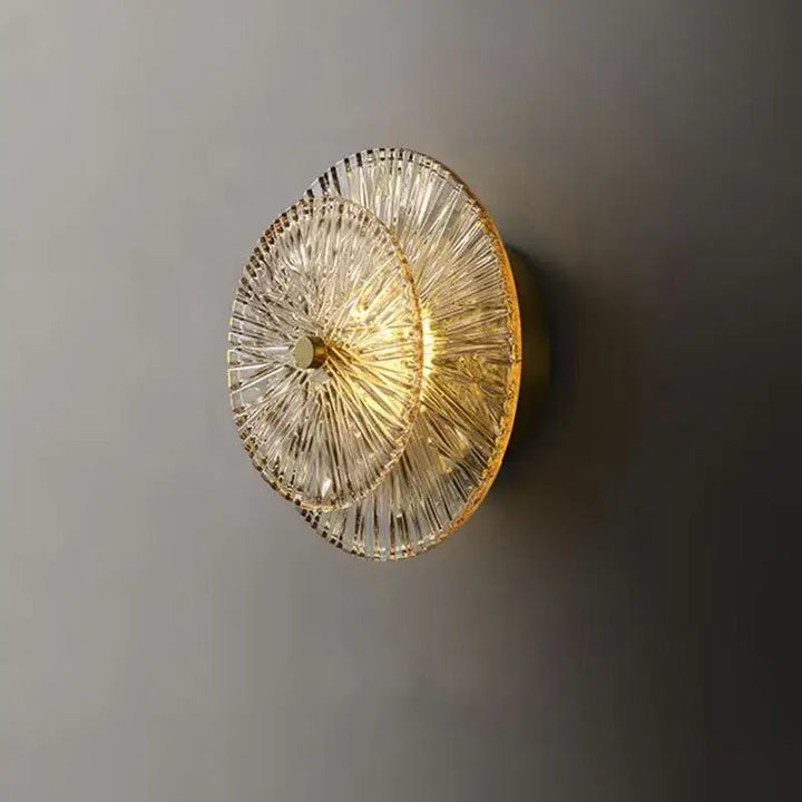 Applique murale dorée ronde en verre