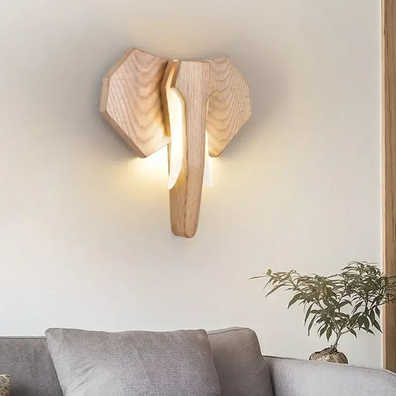Applique murale en bois tête d’animal style sculptural