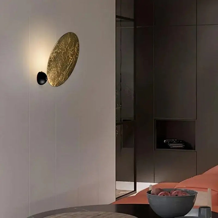 Applique murale ronde LED dorée design effet lune