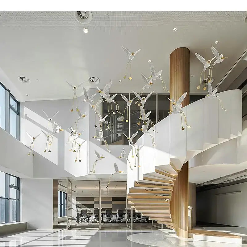 Suspension design oiseaux lumineux blanc et doré moderne
