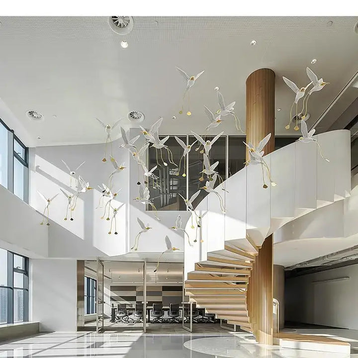 Suspension design oiseaux lumineux blanc et doré moderne
