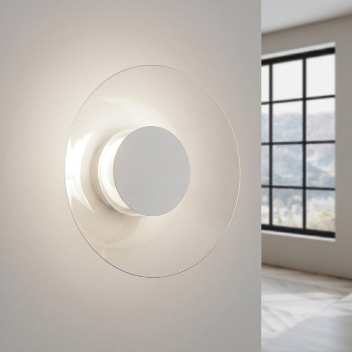 Applique murale ASTRO blanc allumée, halo derrière le disque
