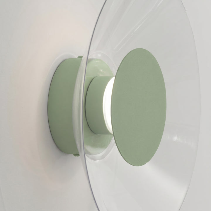 Applique murale ASTRO sauge vue de profil, disque transparent