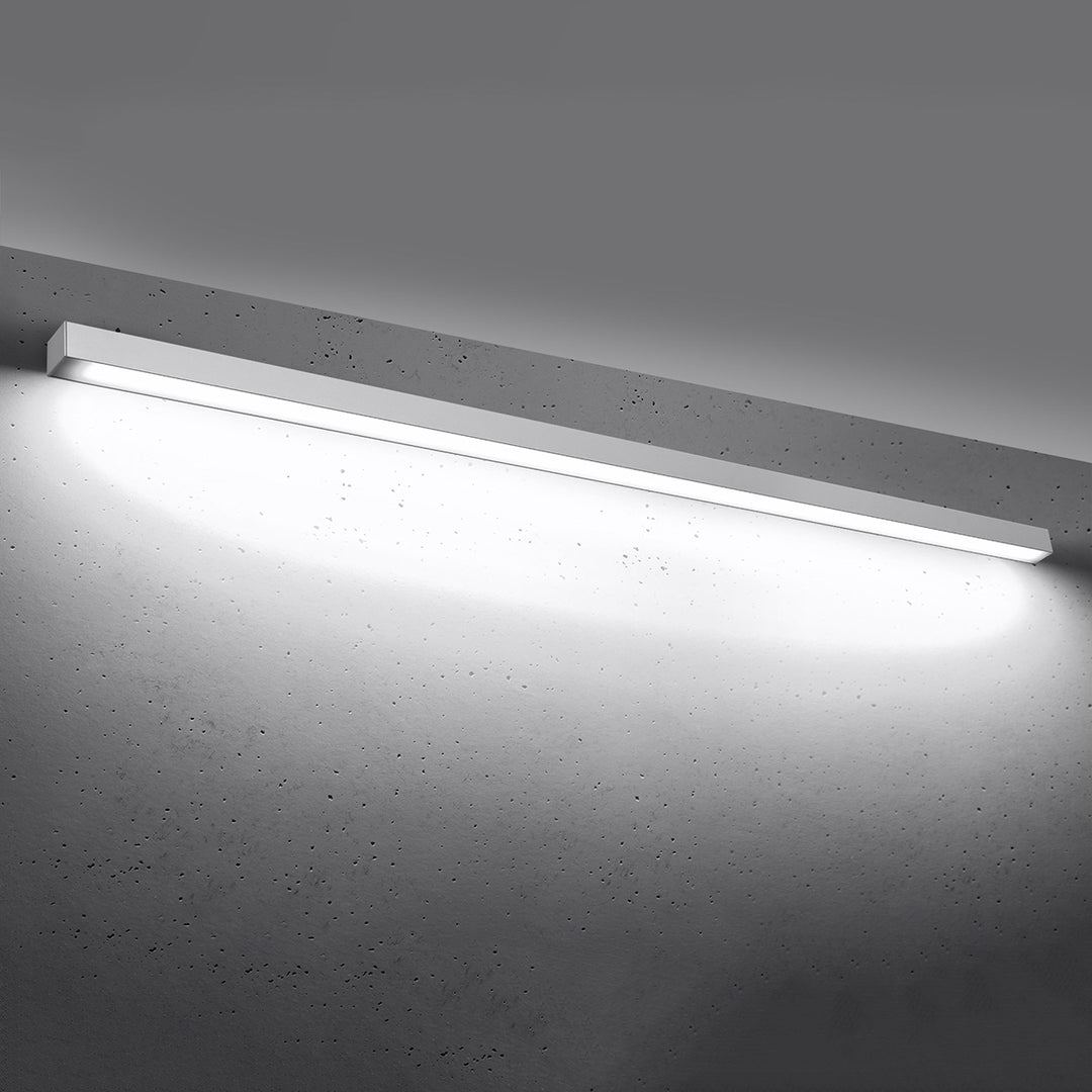 Applique murale linéaire PINNE blanc allumée, lumière vers le bas
