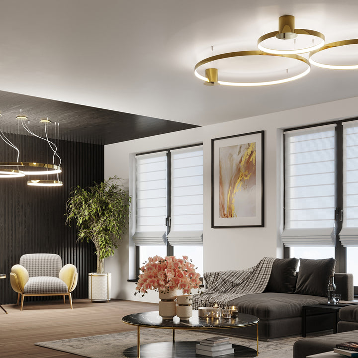 Lustre anneau RIO or poli dans un salon