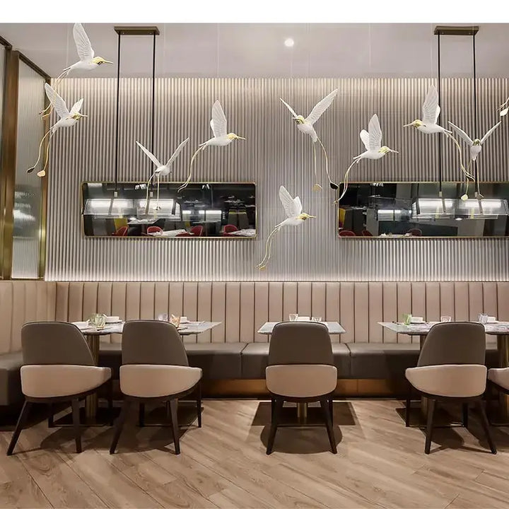 Suspension design oiseaux lumineux blanc et doré moderne
