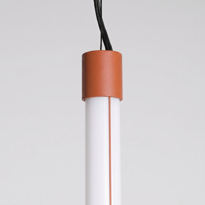 Suspension tube TRANG ocre rouge détail de l'embout