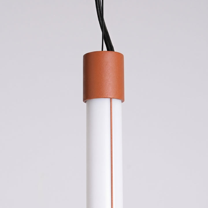 Suspension tube TRANG ocre rouge détail de l'embout