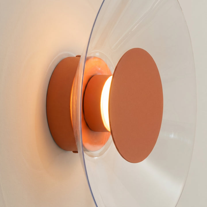 Applique murale ASTRO ocre rouge vue de profil, disque transparent