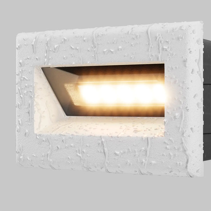 Applique encastrable blanche en relief bosca avec led chaude pour éclairage d’une allée extérieure