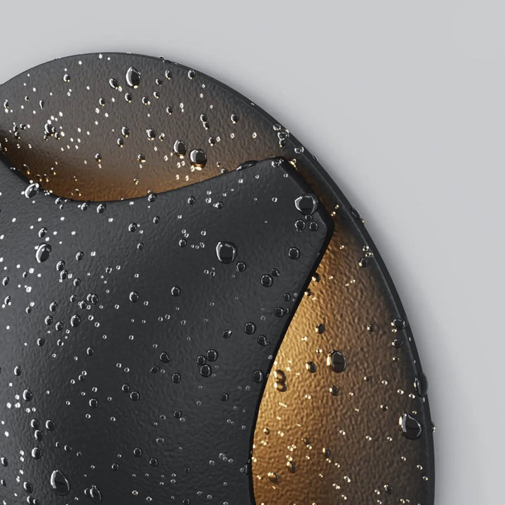 Applique encastrée biscotti en aluminium noir avec design métallique noir et or texturé et en couches