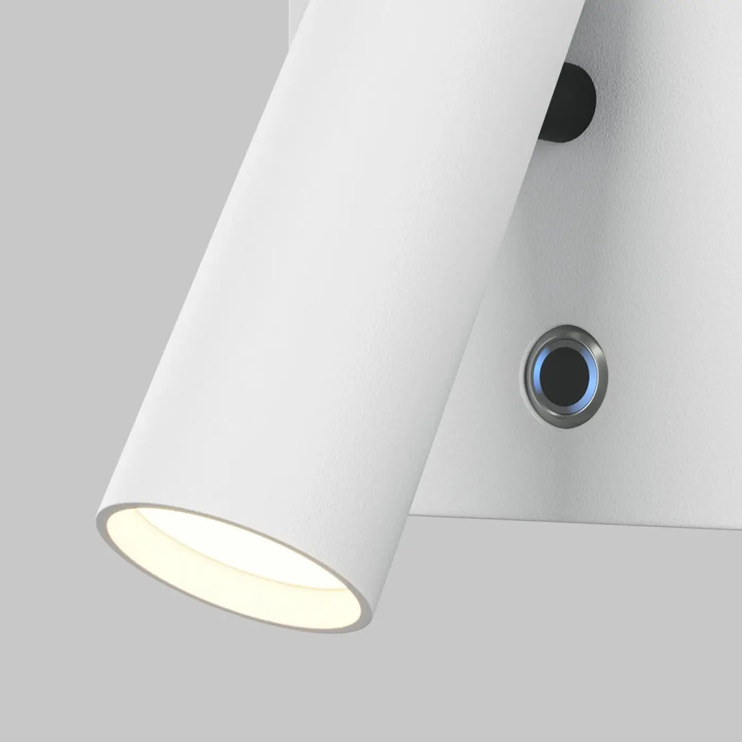 Applique murale aron spot led orientable blanc cylindrique en finition mate avec un éclairage led warm glow