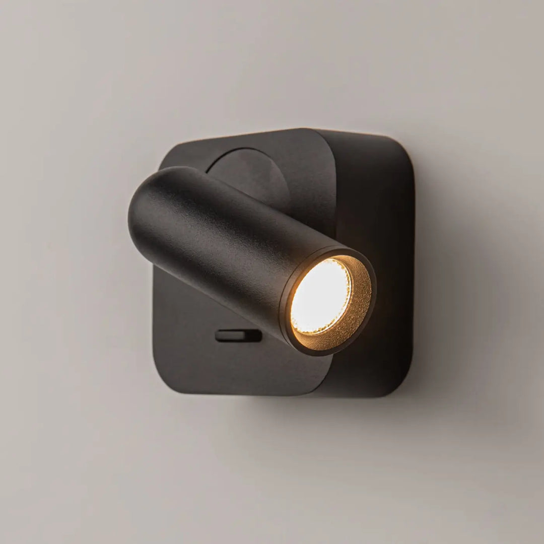Applique liseuse mirax module carré en finition mate noire avec tête ajustable pour un éclairage mural moderne