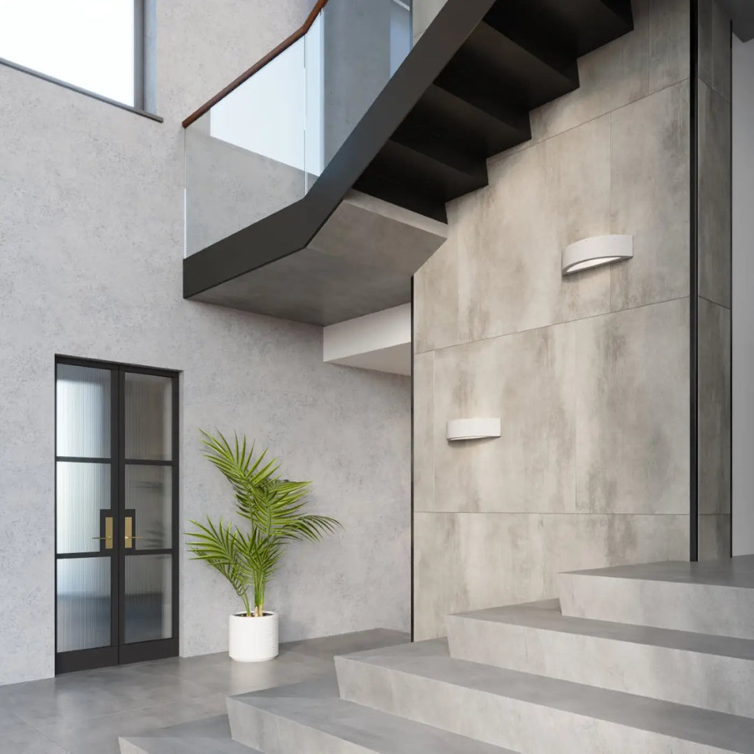 L’applique murale atena en béton blanc minimaliste avec led intégrée pour une atmosphère harmonieuse et agencements industriels