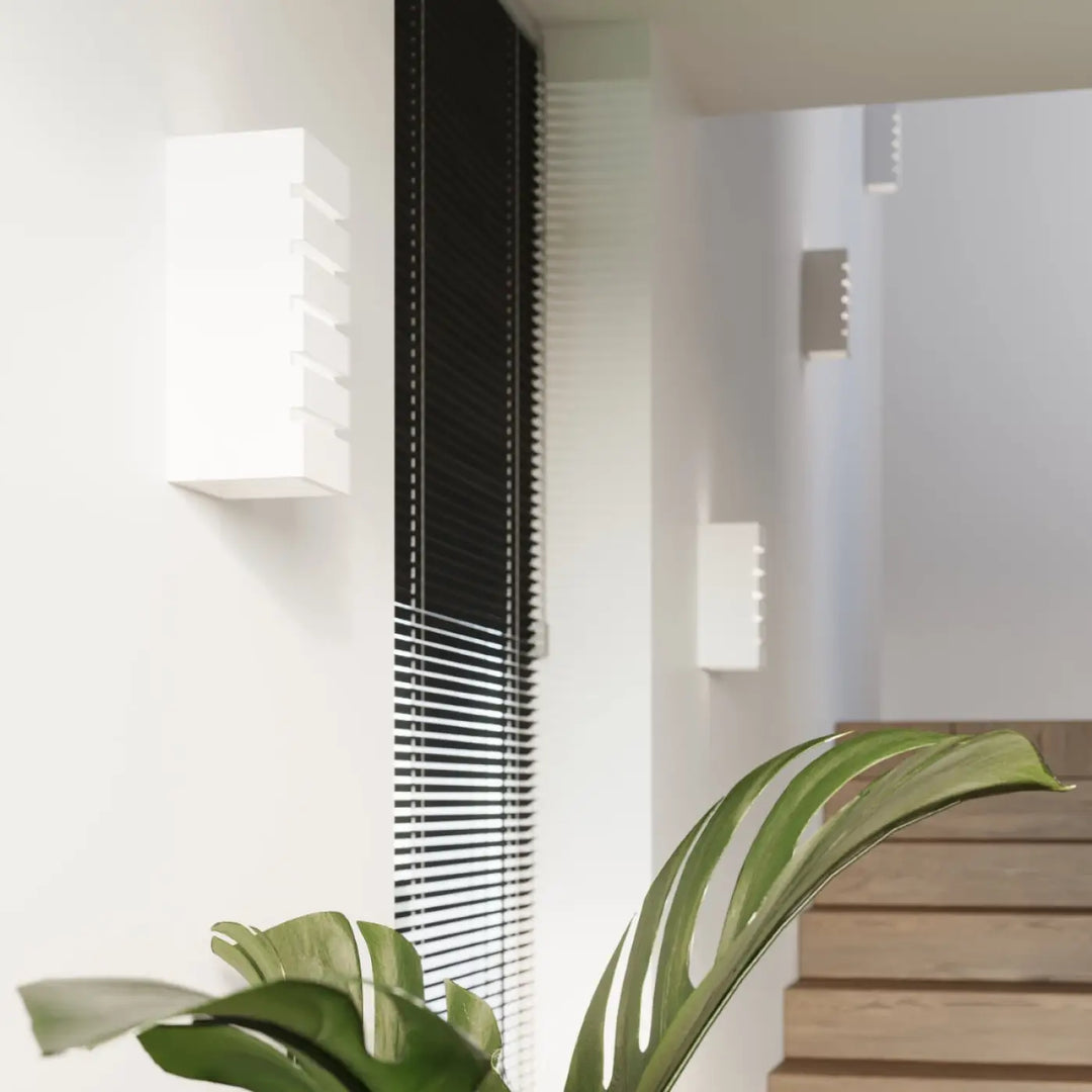 Applique murale céramique samir blanche avec design moderne en marches offrant une belle lumière décorative