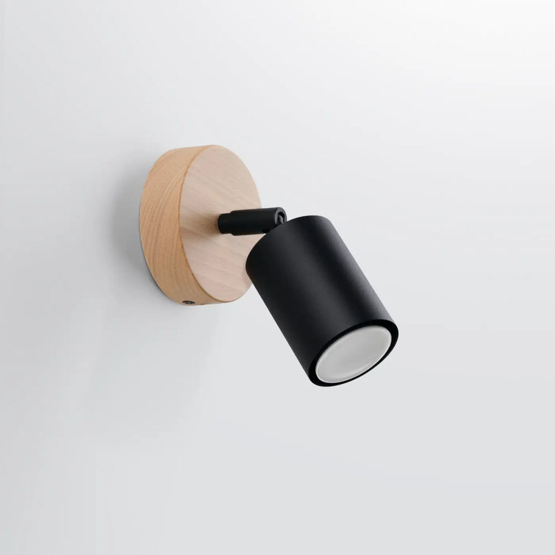 Applique murale verdo noir avec spot cylindrique mat sur base circulaire en bois clair design moderne