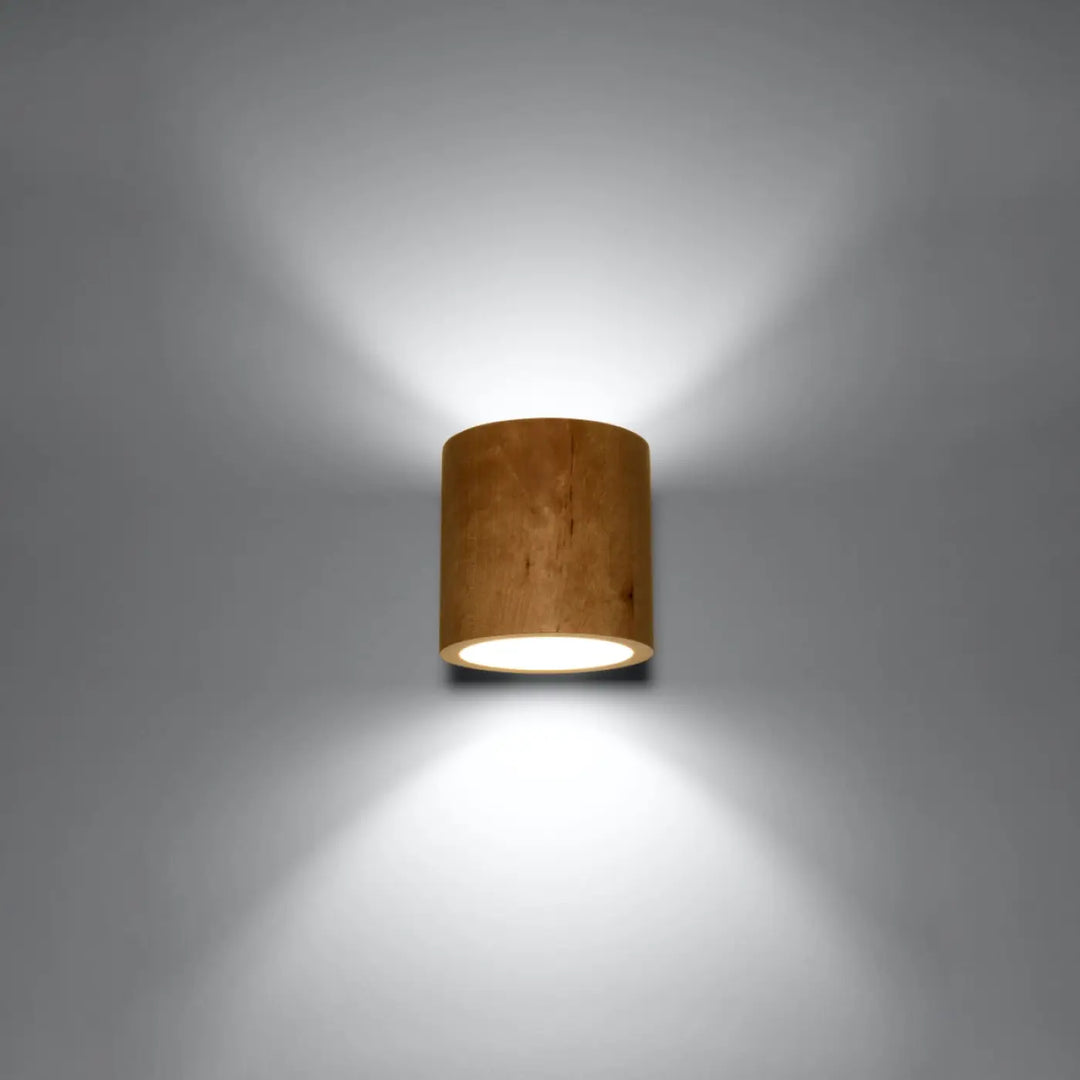 Applique murale orbis en bois naturel cylindrique avec finition chaleureuse et ambiance douce montées individuellement