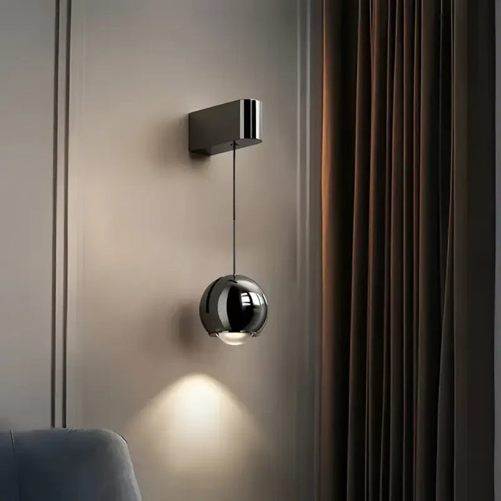 Applique murale boule métal noir orientable style moderne