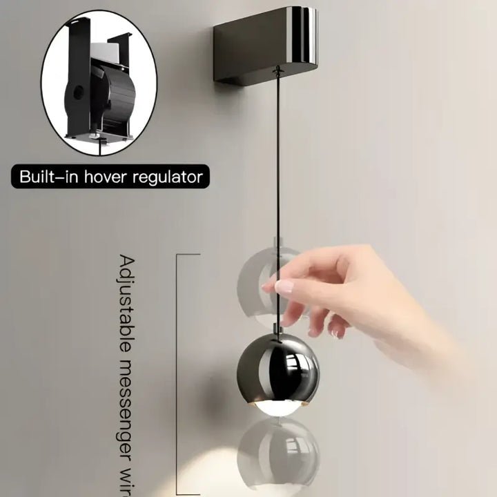 Applique murale boule métal noir orientable style moderne