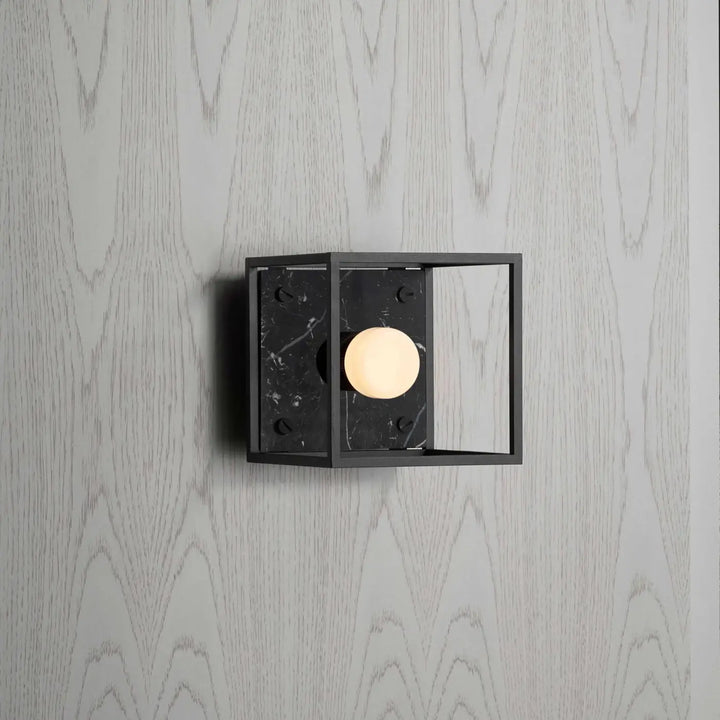 Applique murale Caged Small en marbre noir #couleur_noir