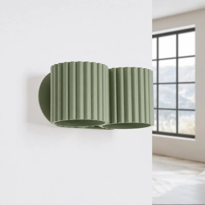 Applique murale vert olive éteinte, vue rapprochée
