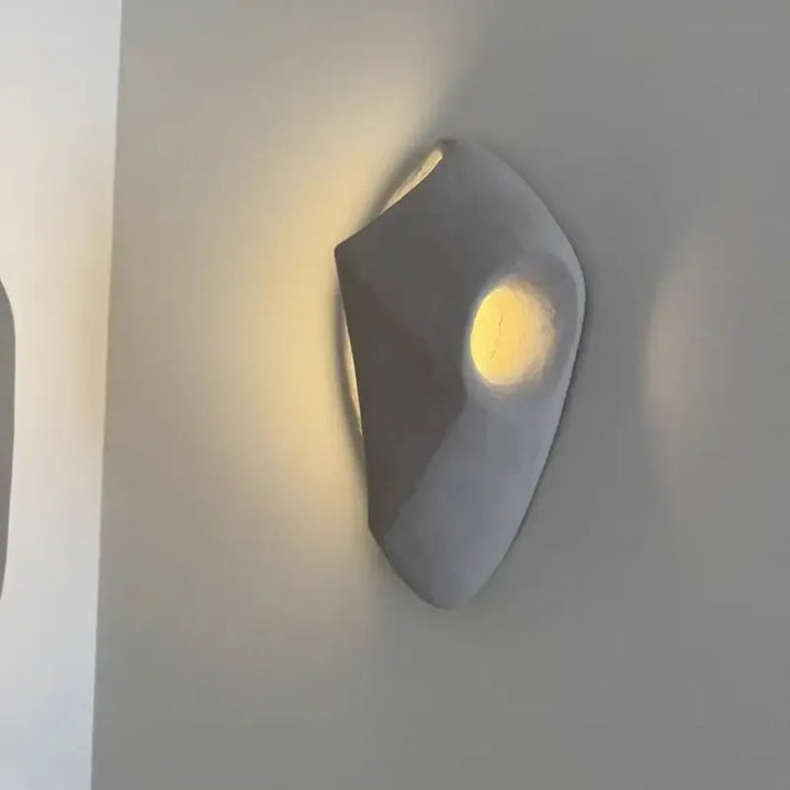 Applique murale cocon en pierre beige

