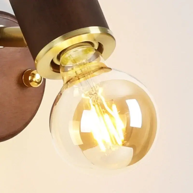 Applique murale couleur caffé avec une ampoule incandescente

