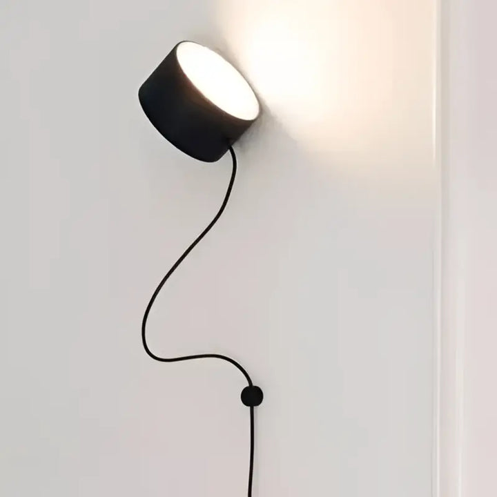 Applique murale design flexible noire avec câble long chic