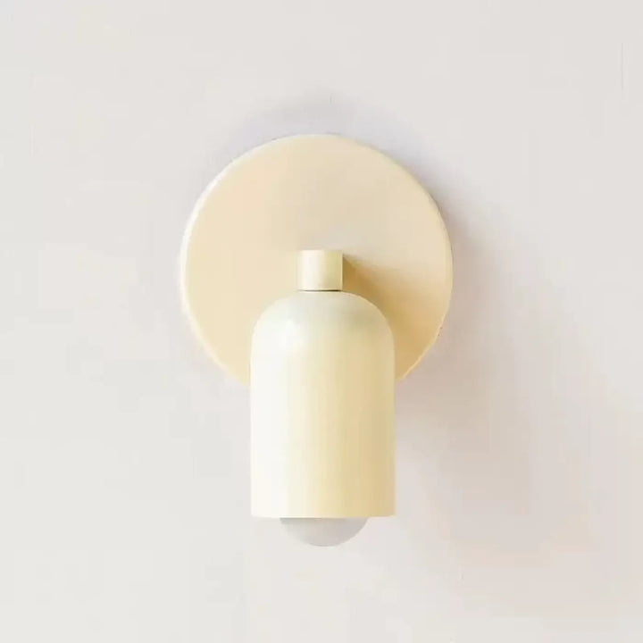 Applique murale design minimaliste cream avec abat-jour cylindrique et plaque circulaire suffit d’un éclairage élégant