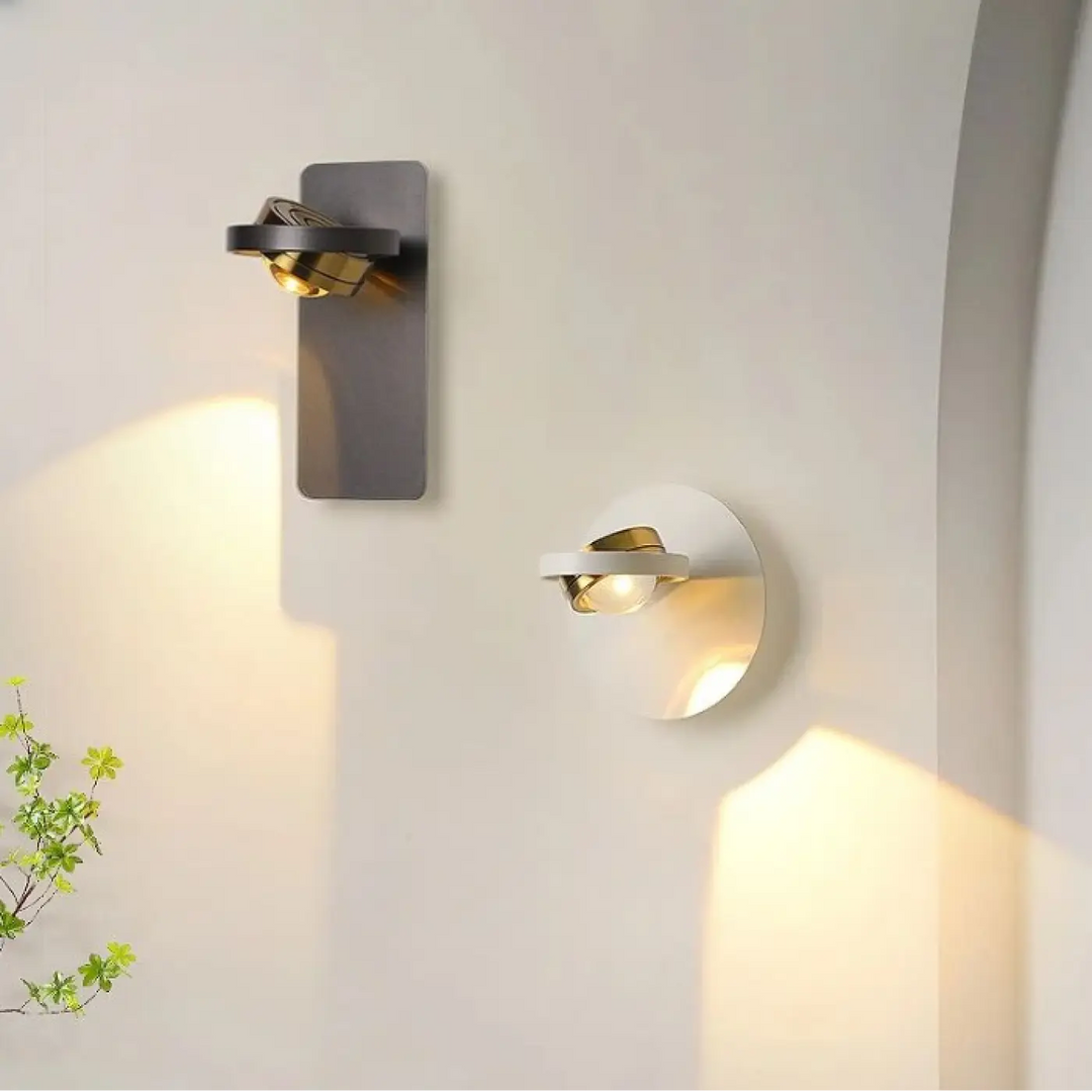 Applique murale fokus avec finition métallique moderne et lumière chaude ciblée pour intérieur élégant