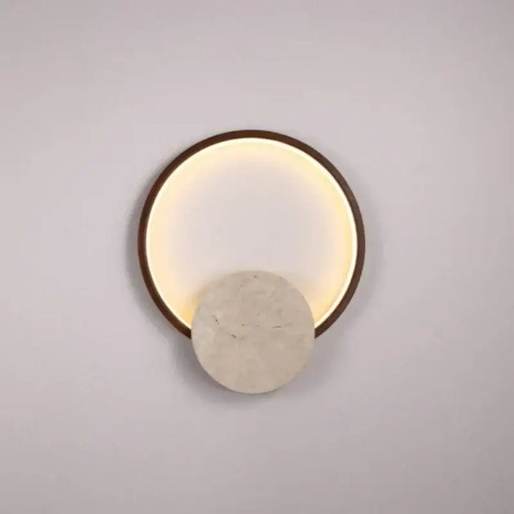 Applique murale design ronde pierre et métal design épuré