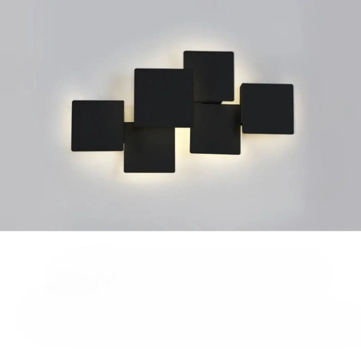 Applique murale kubora noire carrés flottants avec effet lumineux minimaliste et design moderne