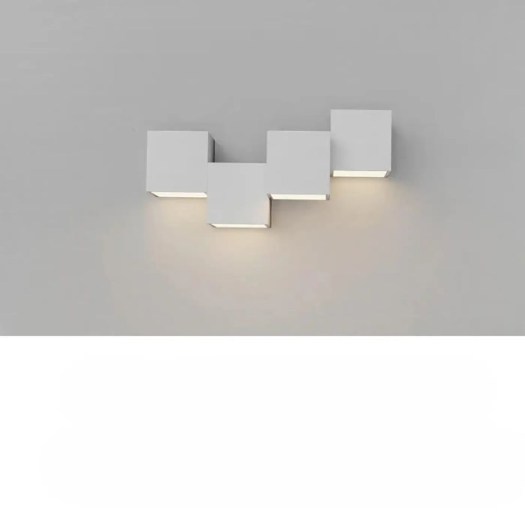 Applique murale kubora carrés flottants en forme de cube blanc avec effet lumineux chaleureux et design minimaliste moderne