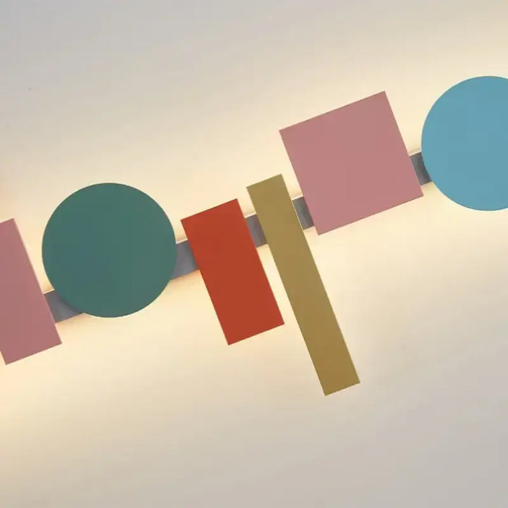 Applique murale géomatrique avec des carrés, ronds et rectangles

