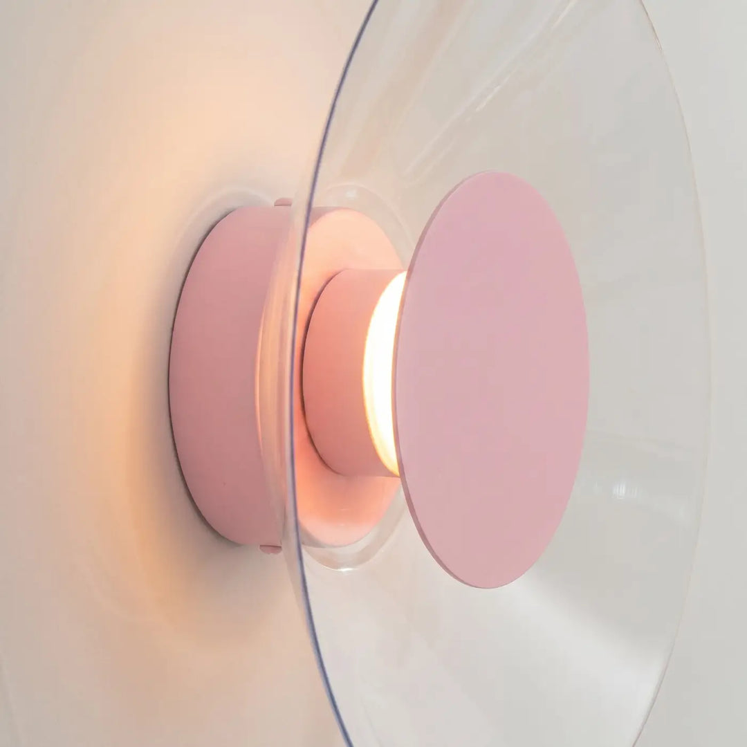 Applique murale ASTRO rose vue de profil, disque transparent