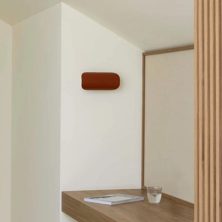 Applique murale Novo terracotta dans une pièce