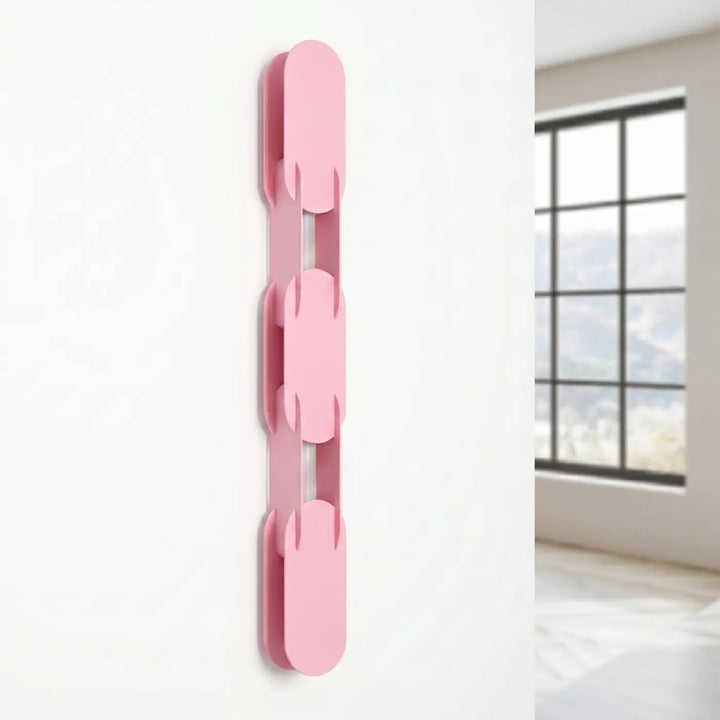 Applique murale CHAIN rose éteinte, posée au mur