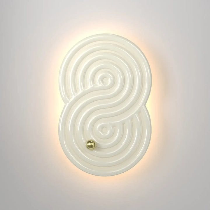 Applique murale cream colorée en céramique avec design tourbillonnant et accent doré pour rock garden applique murale led