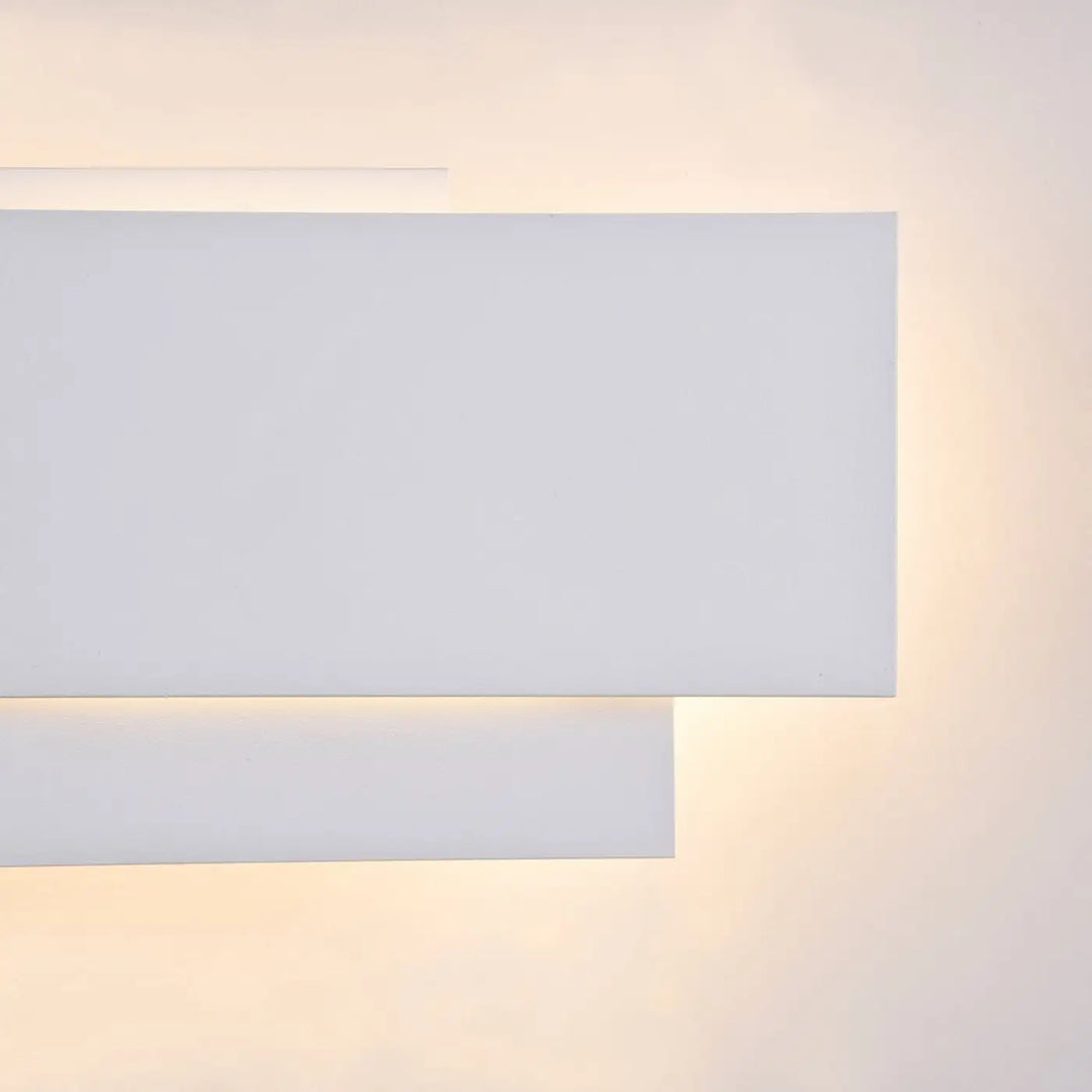 Applique murale led en acier blanc rectangulaire moderne avec éclairage ambiant chaud et design minimaliste