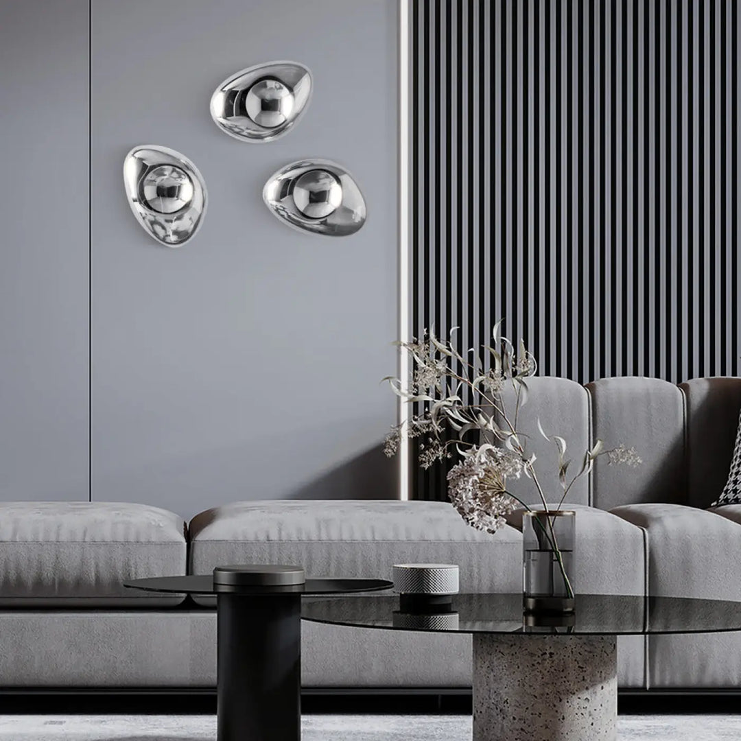 Trois appliques murales mabell en verre miroir argenté au design ovale moderne organique en métal