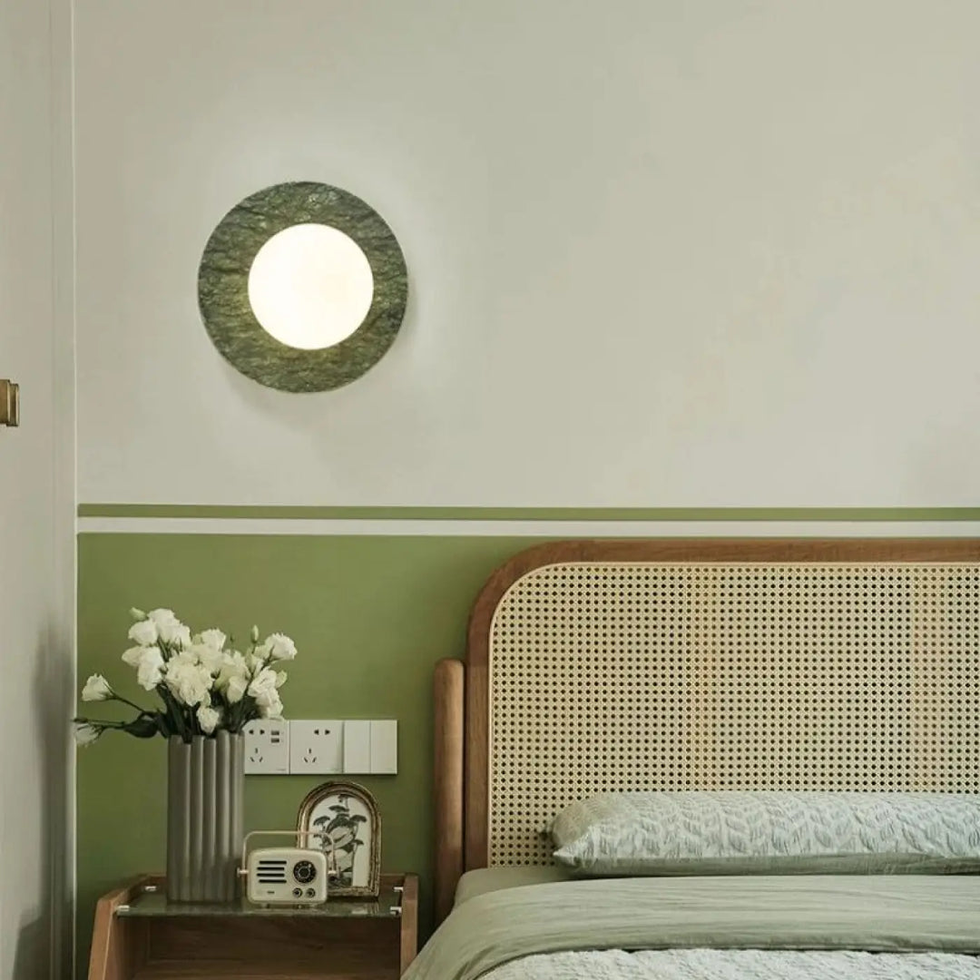 Applique murale emeris circulaire avec cadre vert effet marbre et centre lumineux blanc éclatant