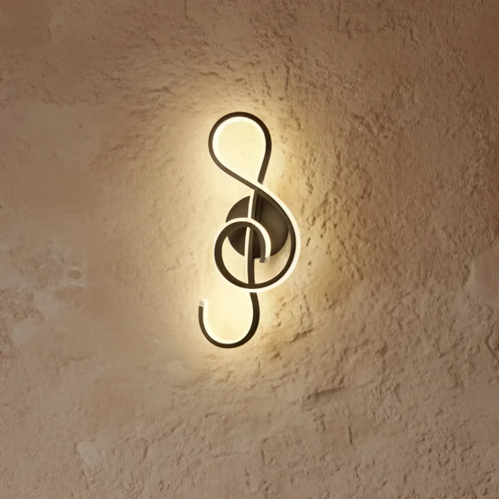 Applique murale musique en métal noir en forme de clé de sol pour une passion musicale et une symphonie visuelle moderne