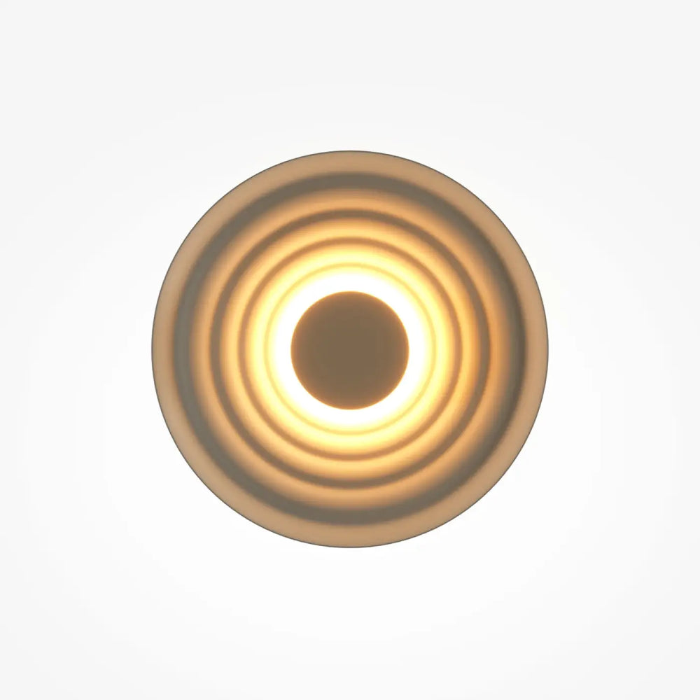 Applique murale nami disque ondulé à led circulaire avec anneaux concentriques et lumière chaude centrale