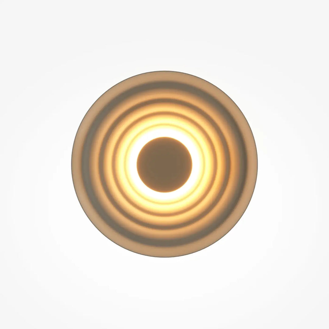 Applique murale nami disque ondulé à led circulaire avec anneaux concentriques et lumière chaude centrale