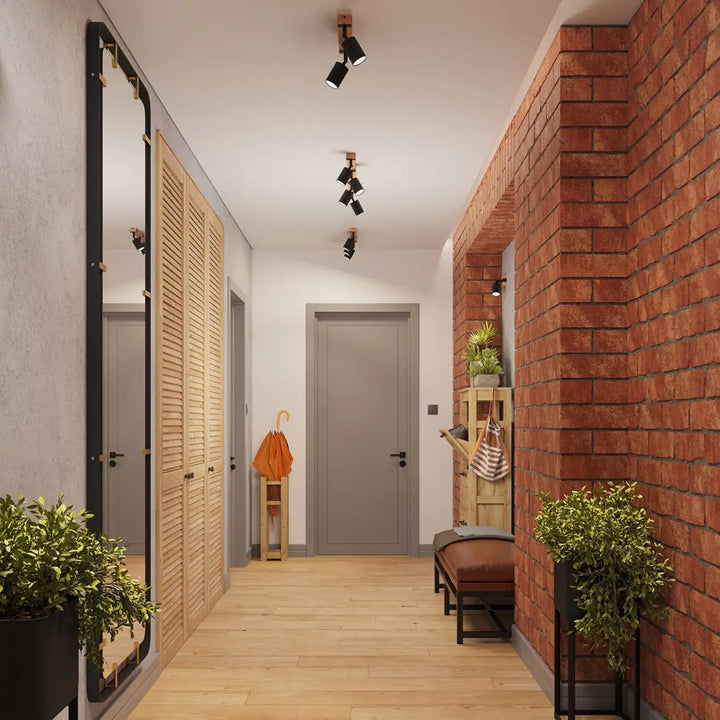 Le couloir présente une applique murale fager 1 noir avec un boîtier moderne et un miroir noir encadré design