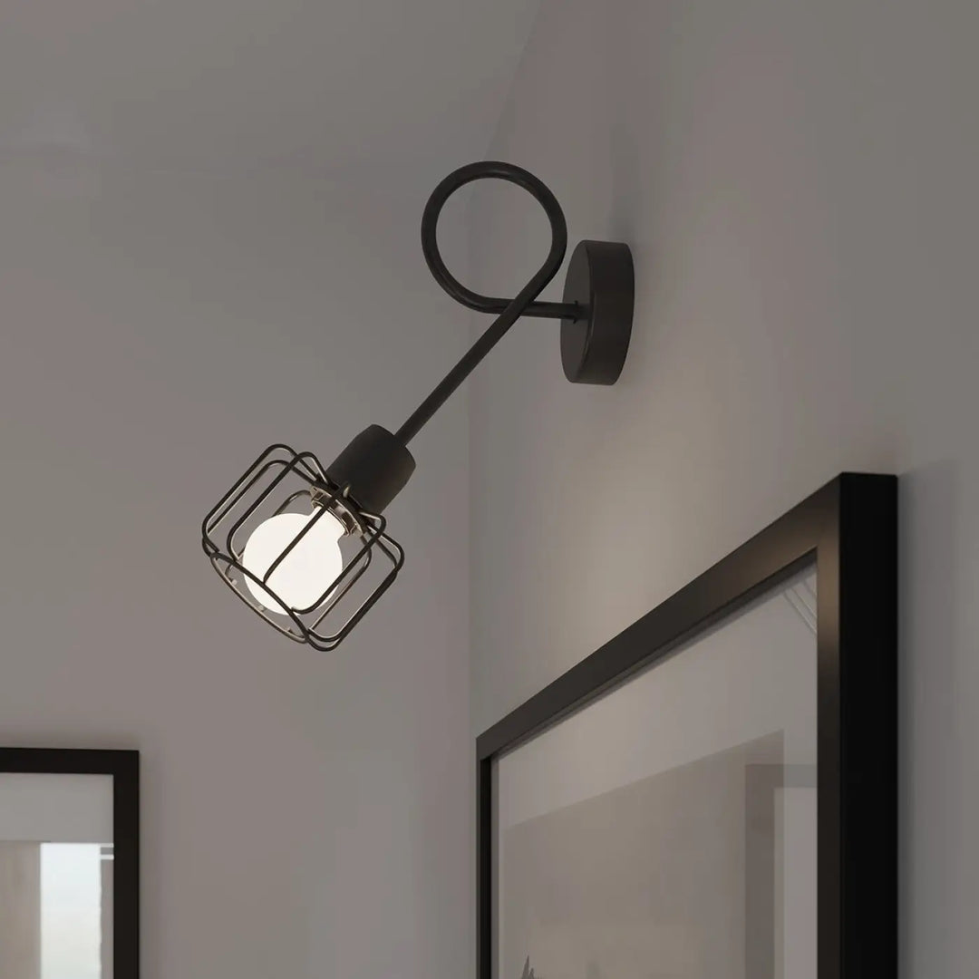 Applique murale beluci 1 noir en fer forgé avec lampe cage style loft collection beluci appliques murales