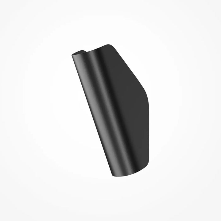 Applique murale notta en métal noir mat avec design minimaliste pour lumière douce et installation compacte